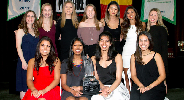 Women's squash with the Award of Merit for Top Team.