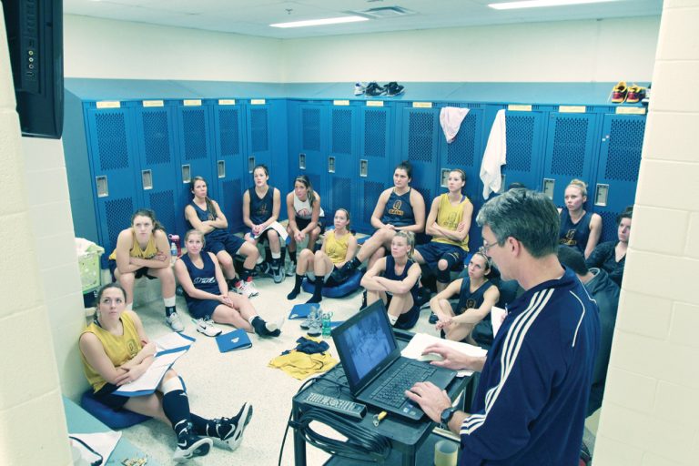 The women’s basketball team watches head coach Dave Wilson conduct a video session at the ARC on Tuesday afternoon.