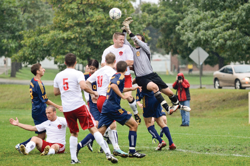 Gaels goalkeeper Marshall Peacock goes up for a ball during yesterday's 2-0 win over the Royal Military College Paladins.