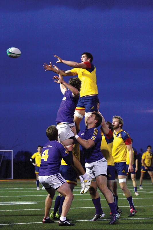 The rugby team attempts a lineout against the Wilfrid Laurier Golden Hawks at West Campus on Friday night.