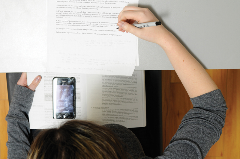 Studies show that digital devices enable students to receive test answers electronically.