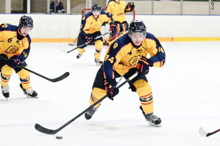 Queen’s men’s hockey captain Corey Bureau (14) played for the OHL’s Mississauga St. Michael’s Majors from 2007-11.
