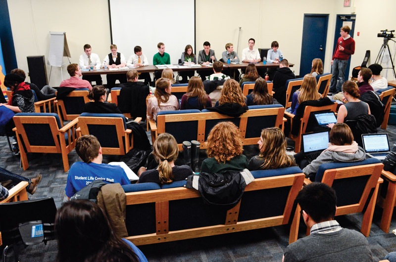 AMS executive candidates participate in the vice-president of university affairs debate on Monday night as part of their campaigning.