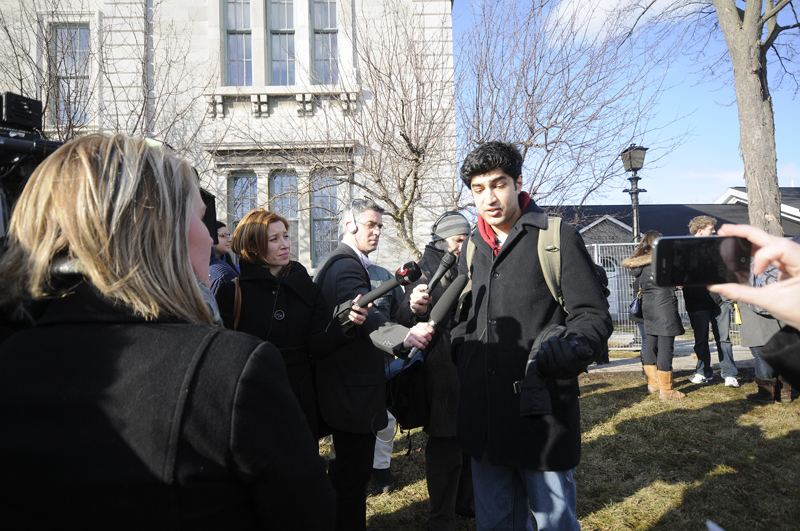 Second-year student Irfan Tahiri speaks to reporters outside the courthouse after the announcement of the guilty verdict.