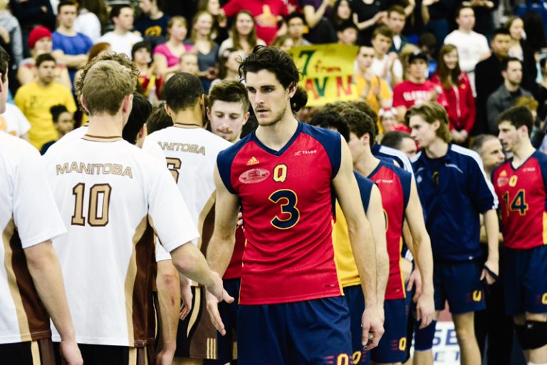 All-Canadian outside hitter Joren Zeeman congratulates Manitoba players following the Gaels' 3-1 loss.