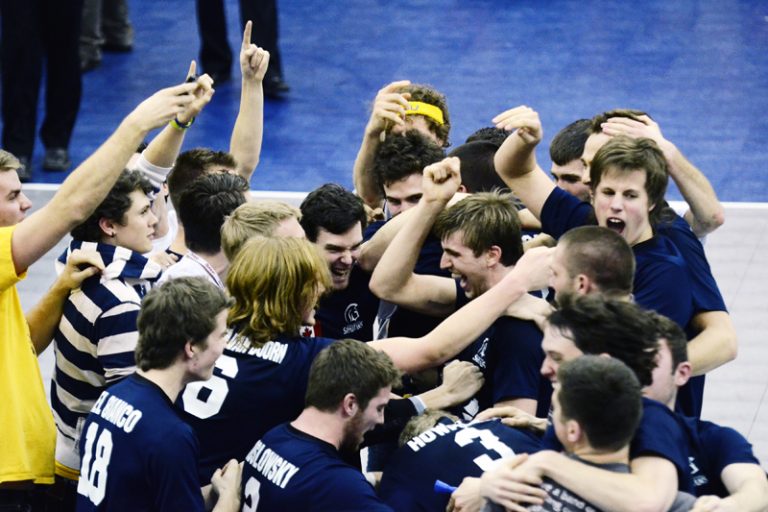 The Spartans celebrate after winning their second straight national championship.