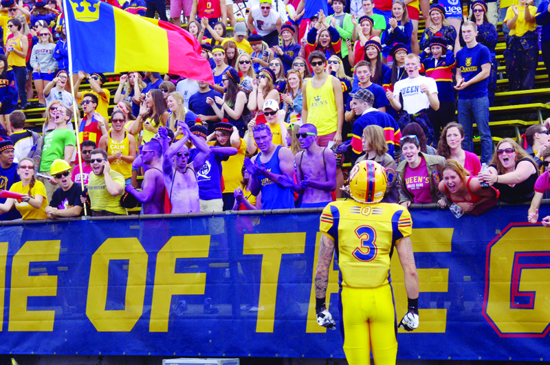 Justin Chapdelaine greets an unofficial homecoming crowd during last year’s game against the Western Mustangs.