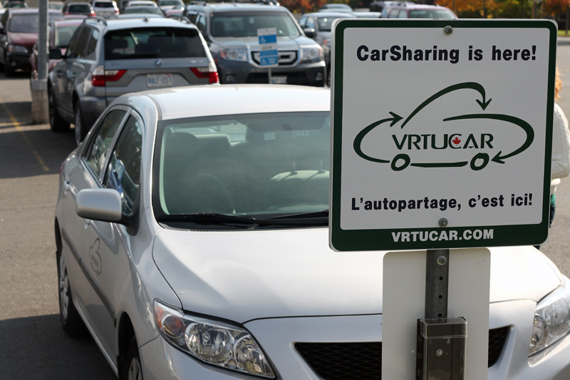 One of three local VRTUCARs sits parked on campus for the Queen’s community to use. The other two cars are located in downtown Kingston.