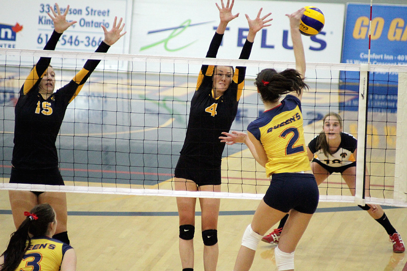 Gaels’ third year right side hitter Kelsey Bishop spikes the ball in Sunday’s game against Waterloo.