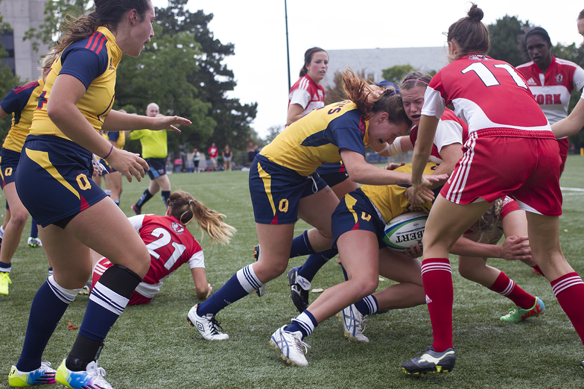 Women’s rugby kicked off their title defence with a 61-12 shellacking of the York Lions. 2014 marks the first season in which the Gaels are the defending champions.