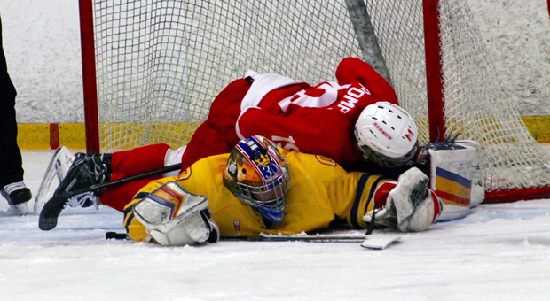 Kevin Bailie covering the puck in the OUA East final.