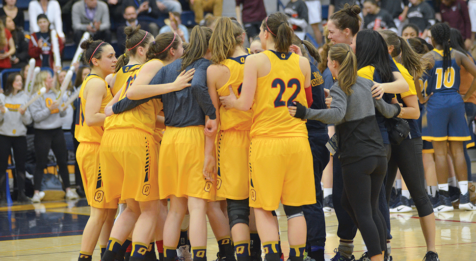 The women’s basketball team celebrating at the OUA Final Four.