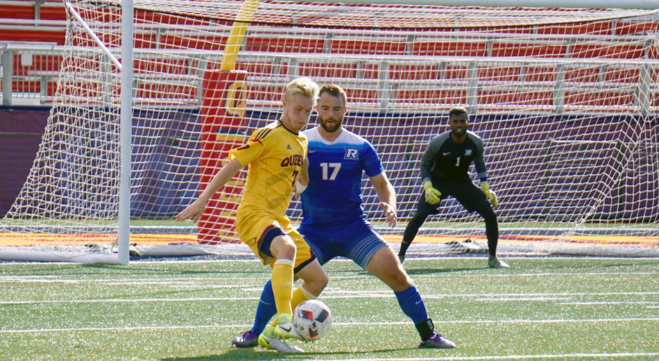 Jacob Schroeter (7) in a one-on-one battle with Rams defender Nathaniel Tambakis (17).