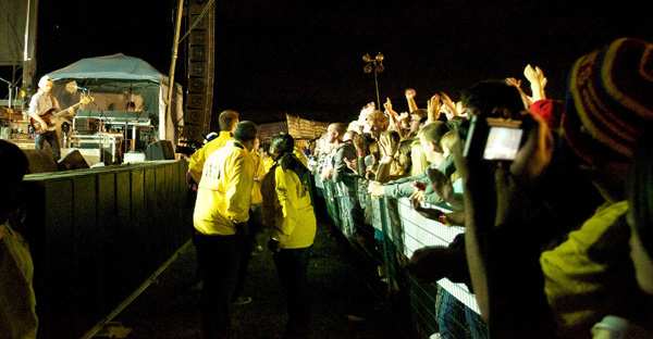 Queen's Student Constables observe observe a crowd of students at last year's Frosh Week concert.