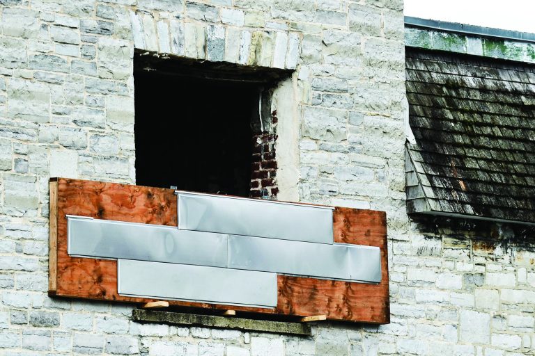 Members of the Municipal Heritage Committee worried that the glare from the proposed stainless steel siding would create a safety haazard for drivers.