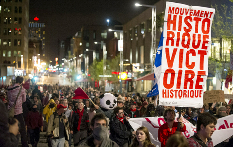 Quebec students march in protest against a provincial plan to increase their tuition by $1