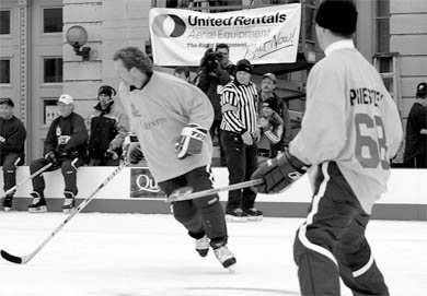 Queen’s men’s hockey head coach Kirk Muller and actor Jason Priestley hit the ice Saturday for the Queen’s University team.