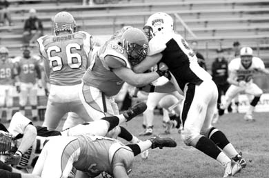 The Gaels battle it out with the Gryphons on Saturday at Alumni Stadium in Guelph.