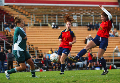 Gaels’ rookie striker Danielle Gibson (16) launches a shot Sunday. The Gaels beat Trent 5-0.