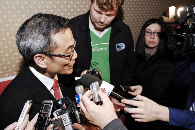Liberal Ted Hsu talks to reporters after being elected MP for Kingston and the Islands on Monday night.