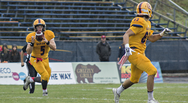 Quarterback Nate Hobbs (#5) and receiver Connor Weir (#85) at Saturday's game.