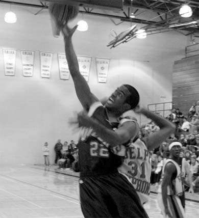 Guard Jonathan Daniels puts up a shot against Guelph.