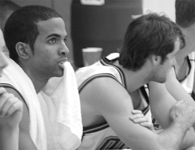 Gaels guard Jonathan Daniels looks on with concern from the bench.