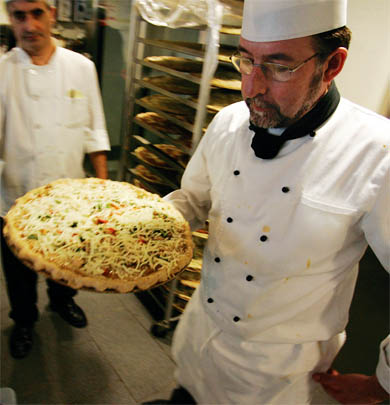 Leonard Cafeteria’s executive chef John Saunders hard at work. See story page 4.