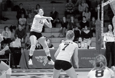 Lousie Hamill (15) goes in for the kill in Saturday’s game against the Ottawa Gee-Gees. The Gaels lost in straight sets.