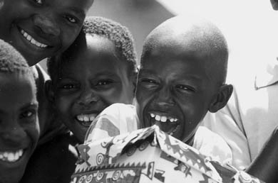 Nigerian children receiving shoeboxes from Operation Christmas Child.