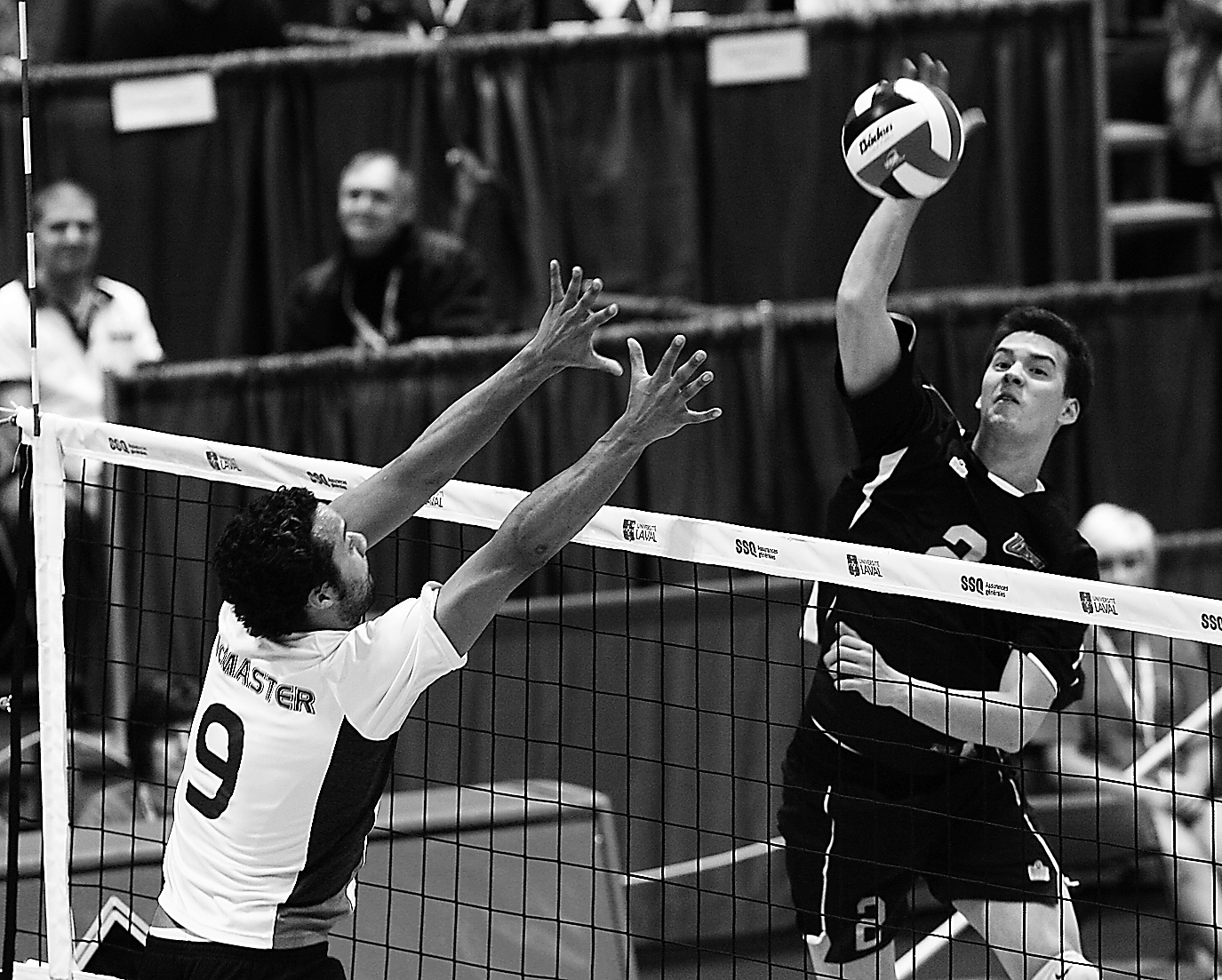 Parrish Offer of the OUA champion McMaster Marauders goes up for a block against Alan Ahow of the Winnipeg Wesmen in the CIS championships Feb. 29. Winnipeg won in four sets