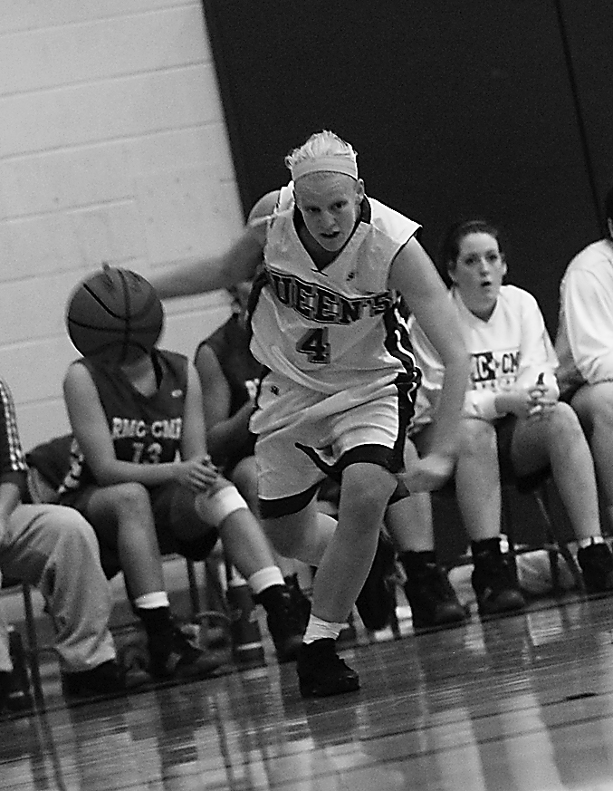 Queen’s guard Lyndsey Gauley drives against RMC Friday.