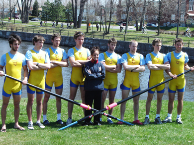 The varsity men’s crew strikes a victory pose after sweeping their events in Montreal on April 30