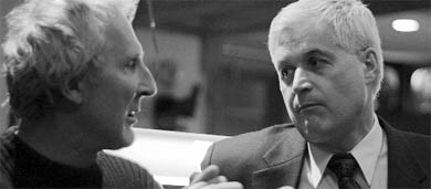 Rob Hutchison (right) congratulates a supporter on a job well done.