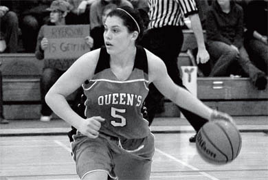 Teddi Firmi surveys the court during Saturday’s game against the Ryerson Rams. The Gaels won 70-46.