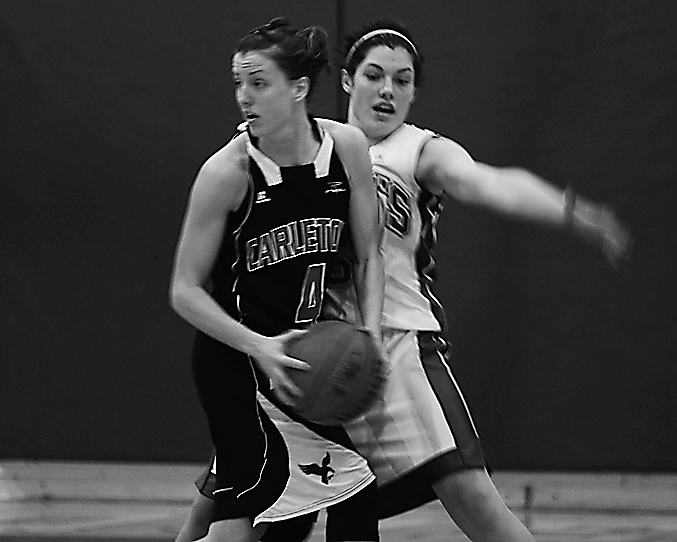 Teddi Firmi guards Carleton’s Tanya Perry in a Jan. 25 game.