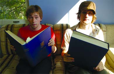 Nich Worby and Devon Lougheed of Tomate Potate take a break from their rigorous practice schedule with some quality reading material.