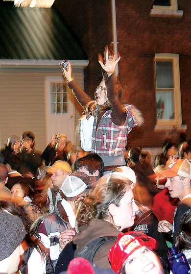 Partiers on Aberdeen Street during Homecoming last year.