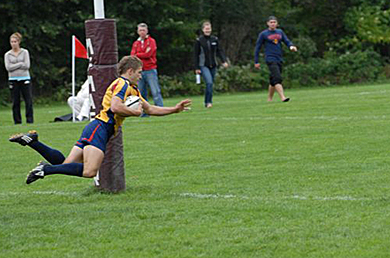 Queen’s outside centre Zach Pancer scores a try against McMaster Saturday.