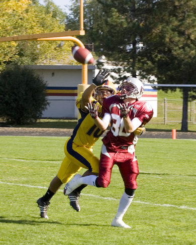 Gaels’ defensive back David Rooney knocks down a pass intended for Ottawa’s Brad Sinopoli.