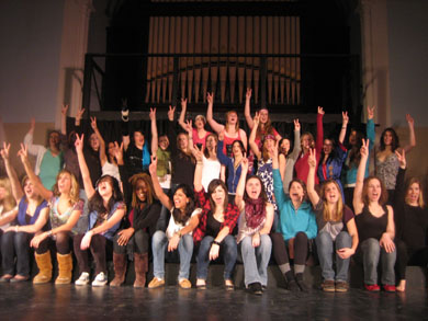 The cast of The Vagina Monologues leads the audience in a rousing chant of the word ‘vagina.’
