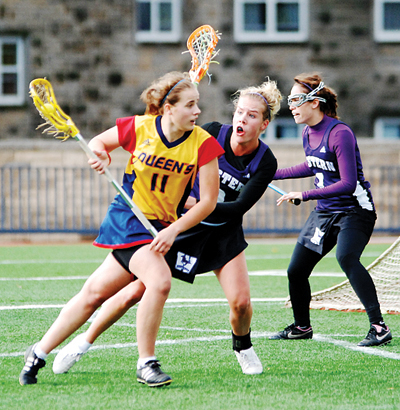 Gaels midfielder Gwyneth Ross looks for a shot on Saturday morning on Tindall Field during Queen’s 8-7 loss to Western.