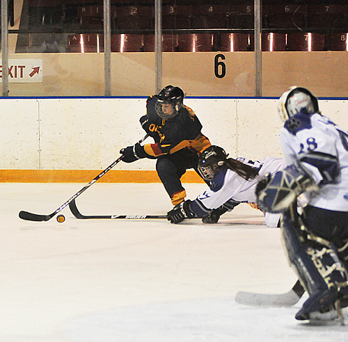 Forward Jess Cone moves around a sprawled Ridgeback defender during the Gaels’ 4-3 overtime win on Saturday at the Memorial Centre. The Gaels also beat UOIT on Sunday.