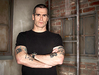 Henry Rollins will make his first visit to Kingston next week when he performs at the Sydenham St. United Church on Wednesday