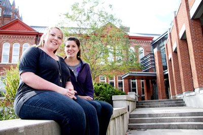 Queen’s Nursing Science Society members President Kathleen Kramer (left) and Social Issues Representative Sarah Estey (right) raise cancer awareness.