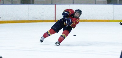 Defenceman Katie Duncan clears the puck in the Gaels’ 6-2 win against the York Lions Saturday night.