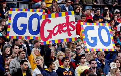 Queen’s students celebrate a football win at Richardson stadium during their run to the Vanier Cup last year.
