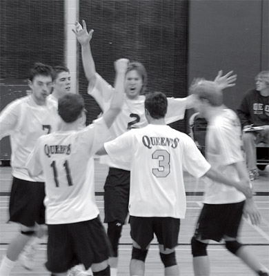 Players congratulate each other after a point against Western.