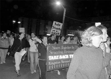 Women of all ages marched through downtown Kingston for Take Back the Night.