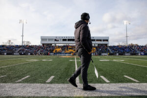 UBC Coach surveys field
